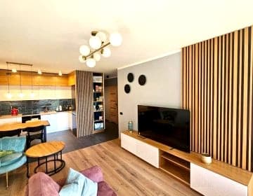 Apartament przy Loftach u Scheiblera parking podziemny, Śniadaniownia